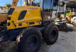 Motoniveladora New Holland RG140B 2011 – 9.000h – Pneus Novos – Belo Horizonte/MG